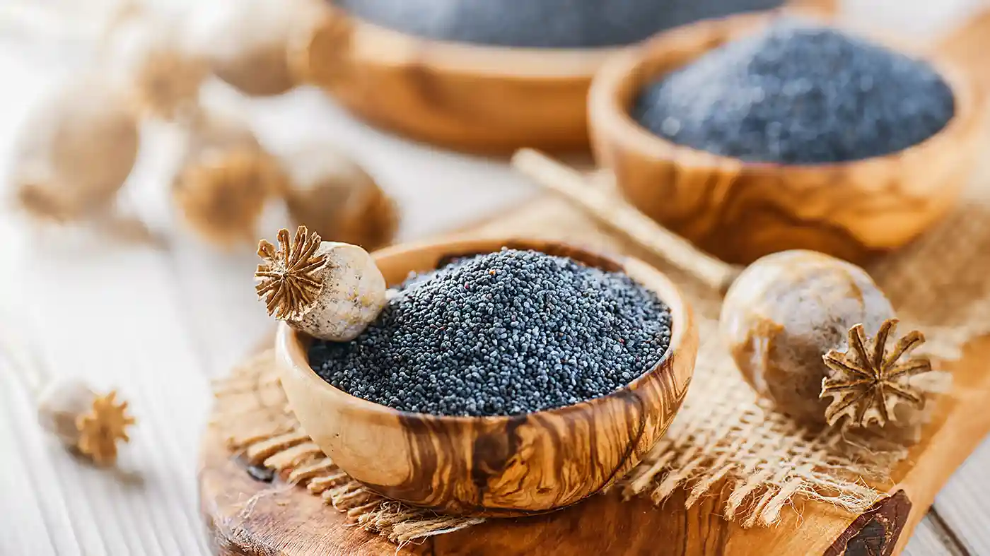 Poppy seeds in wooden bowls